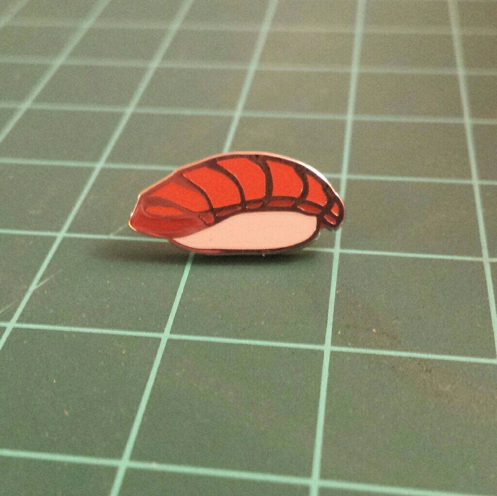 Salmon sushi enamel pin